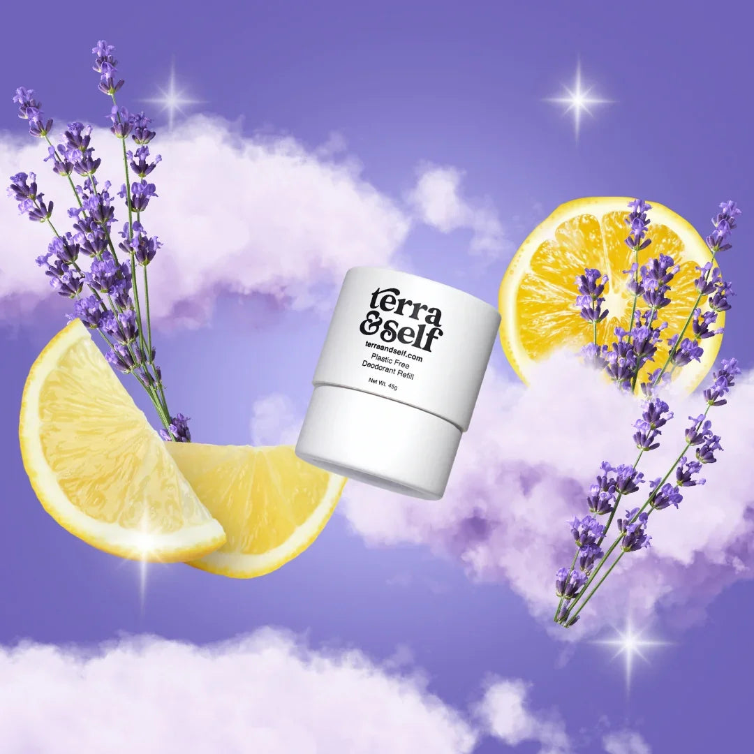 Natural deodorant refill with lemon slices and lavender flowers on a purple dreamy background