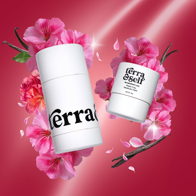 Terra & Self reusable deodorant applicator and plastic-free refill floating among soft purple clouds against a lavender sky, accented with sprigs of lavender, lemon slices, and twinkling star-shaped light flares.