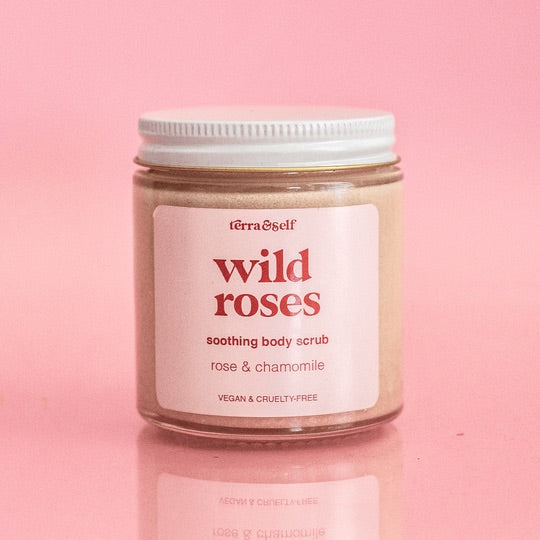 Rose Body Scrub, Wild Roses, is a body scrub with rose and chamomile making it a soothing, exfoliating and softening body scrub.